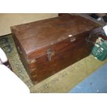 A darkwood Blanket Chest having metal bound corners,