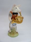 A Beswick figure 'Richard the French Horn Player' from Pig Promenade. (French horn repaired).