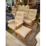 An "Ercol" elm framed Lounge Suite comprising a pair of armchairs,