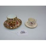A Crown Derby coffee can and saucer in Imari and gilt, code for 1906,