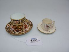 A Crown Derby coffee can and saucer in Imari and gilt, code for 1906,