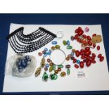Miscellaneous vintage beads and others, jet dress ornament, Guinness button, etc.