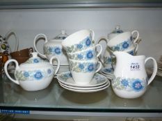 A quantity of Wedgwood 'Clementine' tea, dinner and coffee ware to include; tea & coffee pots, cups,