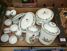 A quantity of Worcester 'Herb' china to include; spice/herb jars, two biscuit jars,