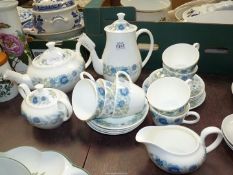 A Wedgwood 'Clementine' part tea service to include; 7x cups & saucers, one tea plate, a teapot,