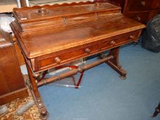 An unusual Mahogany circa 1900 writing Desk having three frieze drawers to the rear of the writing
