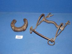 A Victorian military horse bit, holed for fitting badges to sides,