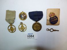 A small quantity of badges including 9ct gold and enamel 'West Cheshire A.F.