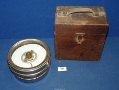A Racing Pigeon timing/clock in a wooden case.
