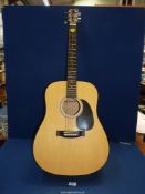 A "Squier by Fender" 093-0300-021 Acoustic Guitar with protective cover.