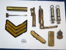 A small quantity of miscellanea including two Air raid precautions whistles, silver ARP badge,