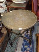 A Benares table and stand, 23 1/2" diameter.