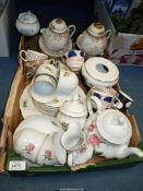 A part continental tea set to include teapot, six tea plates, six saucers, milk jug, etc.