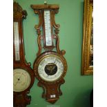 A carved Oak banjo Barometer with mercury thermometer, 33" tall, top missing.