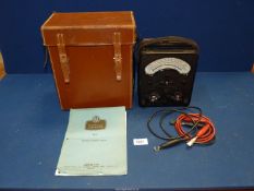 A leather cased Universal AVO meter, model 40, with instructions.