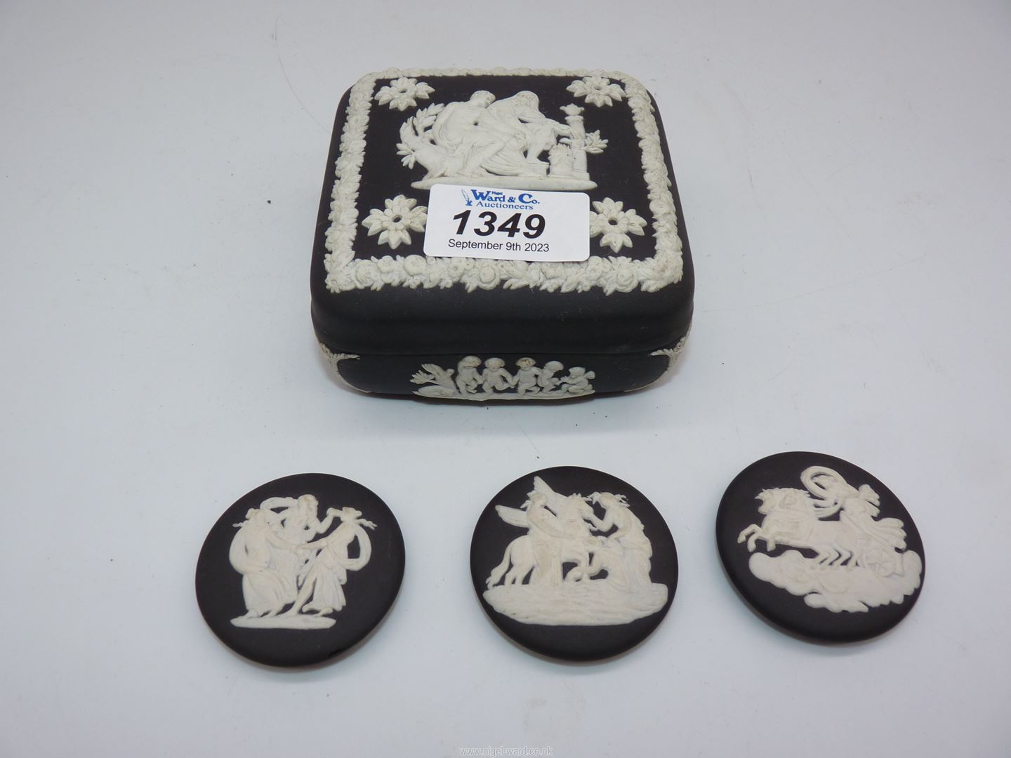 A Wedgwood black and white Jasperware box and cover,