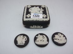 A Wedgwood black and white Jasperware box and cover,