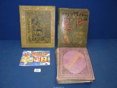Three old scrap books and albums with contents of Christmas and New Year cards,