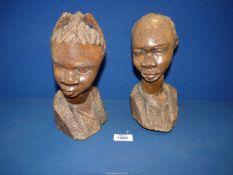 A pair of well carved African tribal busts, approx. 9 1/2" high and 1.
