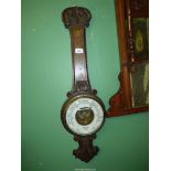 An Oak Barometer by Dolland London (a/f, thermometer missing). 33" tall.