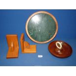 A green circular marble stand set in cedar (13" diameter),