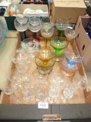 A quantity of coloured and clear glass including hock glasses, sundae dishes, etc.