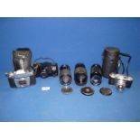 A quantity of photographic equipment to include; vintage Halina Anastigmat 35 Empire made camera,