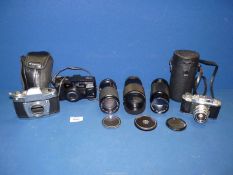 A quantity of photographic equipment to include; vintage Halina Anastigmat 35 Empire made camera,