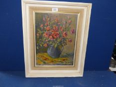 A framed Oil on board titled verso "Roses", signed lower right A.C. Winter, 17 1/2" x 21 1/2".