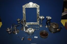 A quantity of plated items including a pair of posy vases, candelabra, coaster, teapot, toast rack,