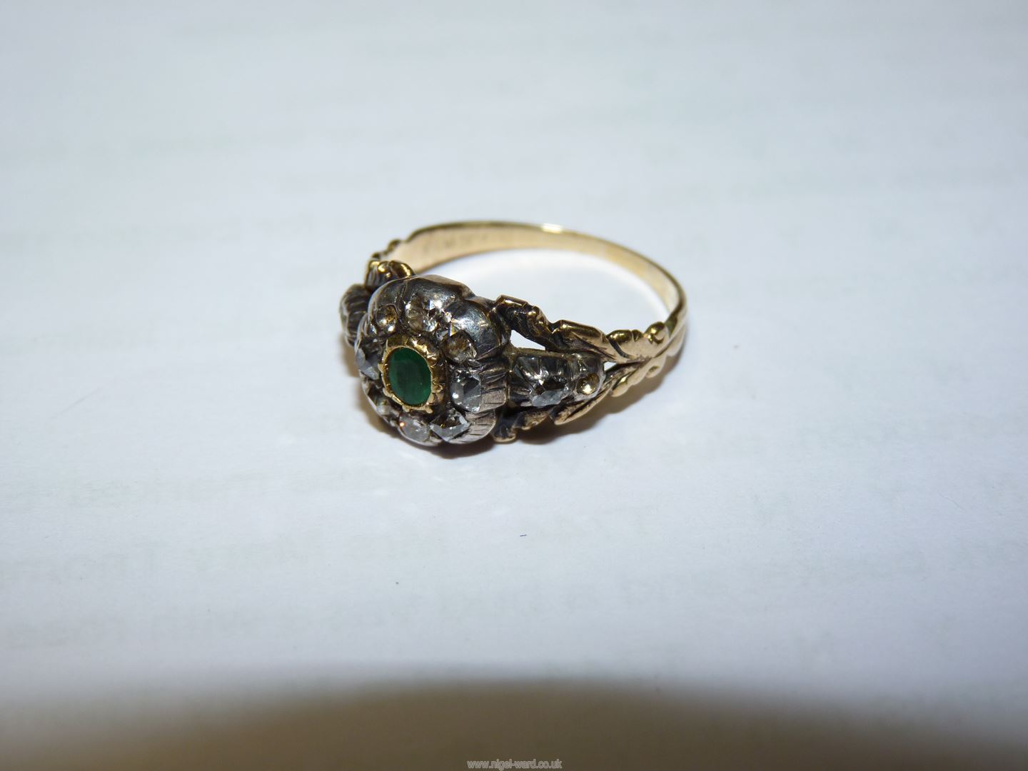 A pretty Georgian diamond and emerald ring - the small lozenge shaped emerald surrounded with rose - Image 3 of 4