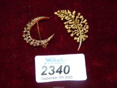 Two 9ct gold brooches; one in crescent shape set with garnets,