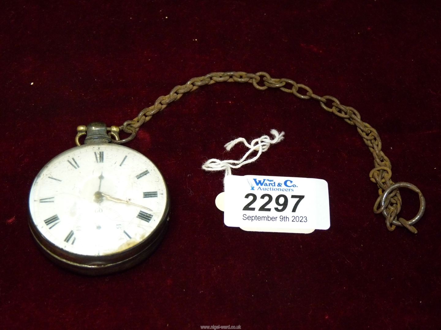 A Silver pocket watch, possibly London 1808 with a hinged dome glass cover,