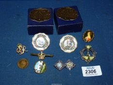 A small quantity of costume jewellery including; Celtic brooches, scarf clasp, George VI brooch,