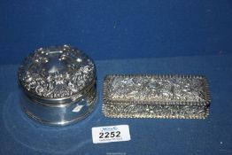 A silver circular jewellery pot with hinged lid (hinge a/f.