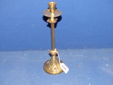 A rare 19th century Augustus Pugin influence brass candlestick with square pillar standing on round