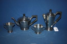 An unusual shaped Silver four piece Tea service, Birmingham 1941,