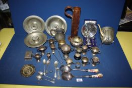 A box of mixed metals to include an ashtray, jug, trophies, etc.