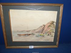 A framed and mounted Watercolour depicting Beach scene with boat and figures,