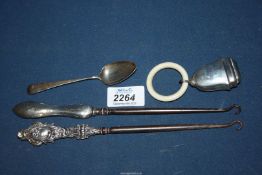 Two silver handled button hooks,