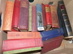 A box of books to include The Holy War by John Bunyan, Shirley by C.