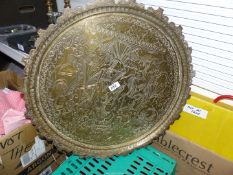 An Indian brass tray. 24" diameter.