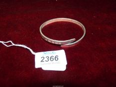 A 925 silver Bangle lightly engraved "Norma" to one end, London hallmark, 25 gms.