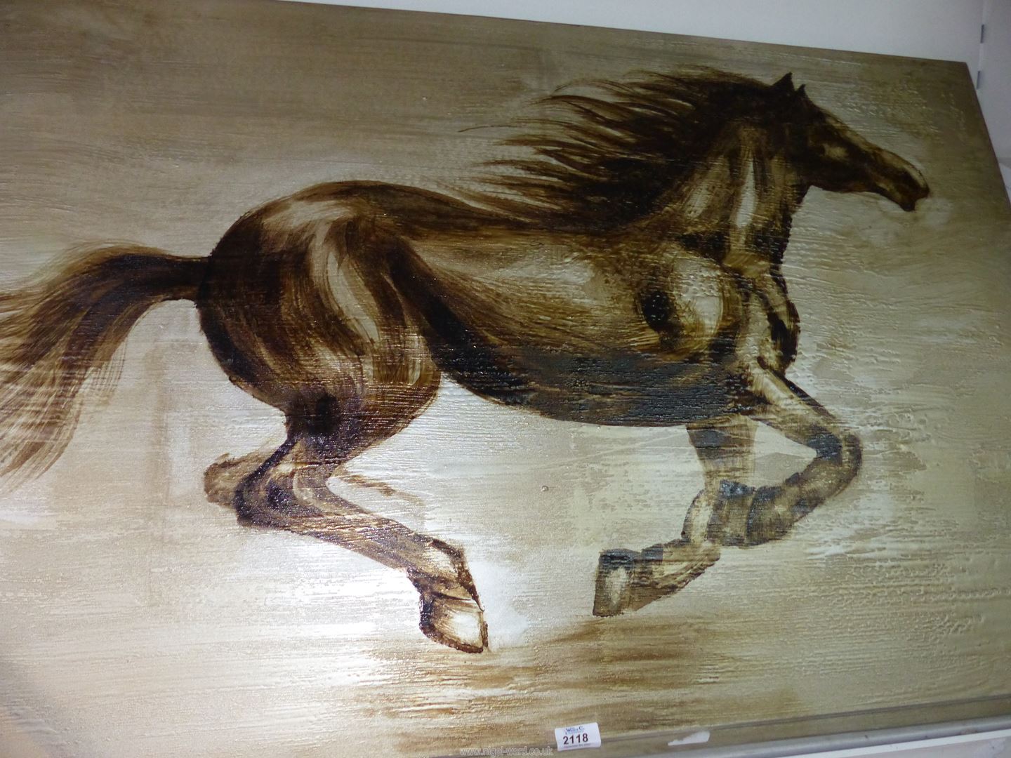 A large modern Print on canvas of a Horse galloping, 47 1/4" x 31 1/2".