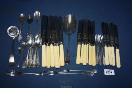 A quantity of cutlery including knives, plated pastry forks, grapefruit spoons etc.