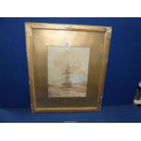 A framed and mounted Watercolour depicting a sailing ship beached in an estuary with figures and a