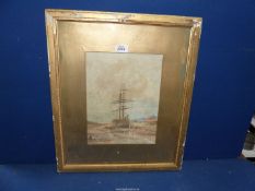 A framed and mounted Watercolour depicting a sailing ship beached in an estuary with figures and a
