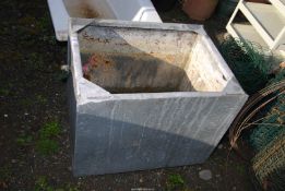 A galvanised water tank - 28½" x 22" x 22" high.
