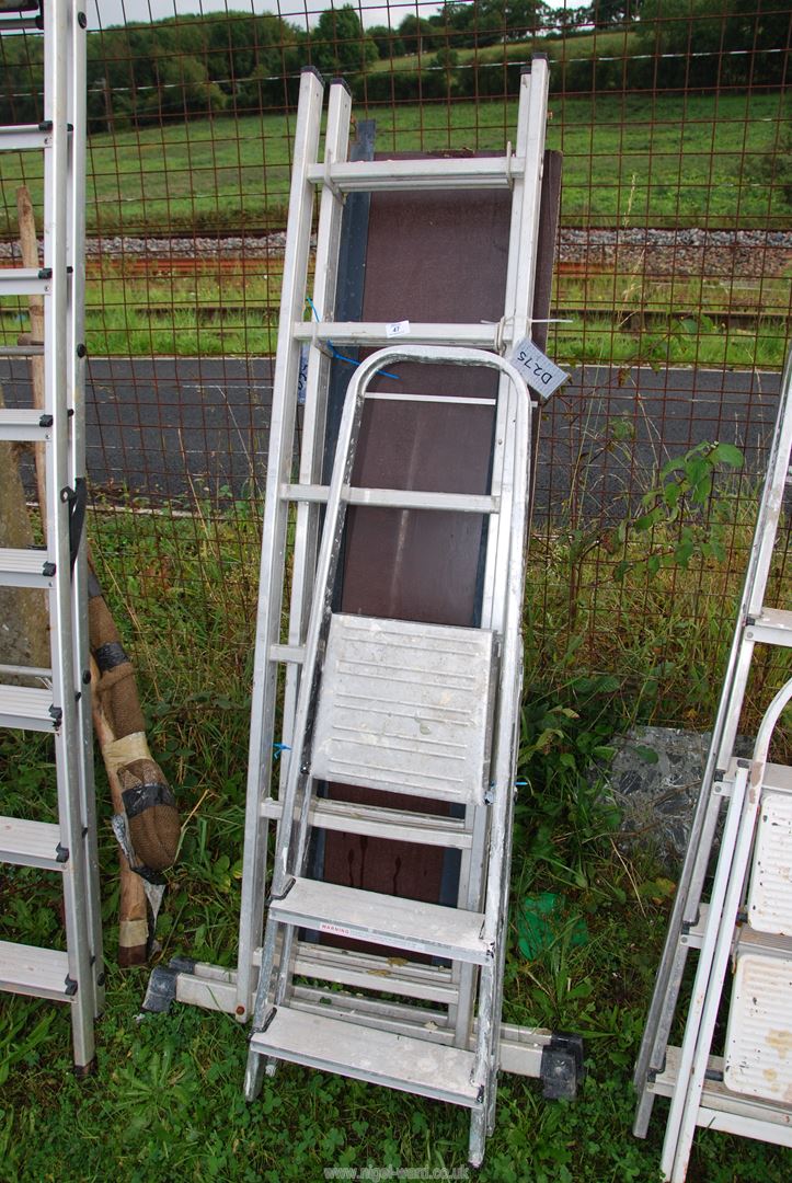 A three rung step ladder and an aluminium platform.