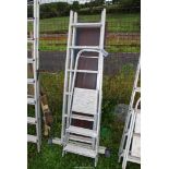 A three rung step ladder and an aluminium platform.